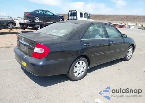 2003 Toyota Camry Le z USA, uszkodzony, nr VIN 4T1BE32K33U130034